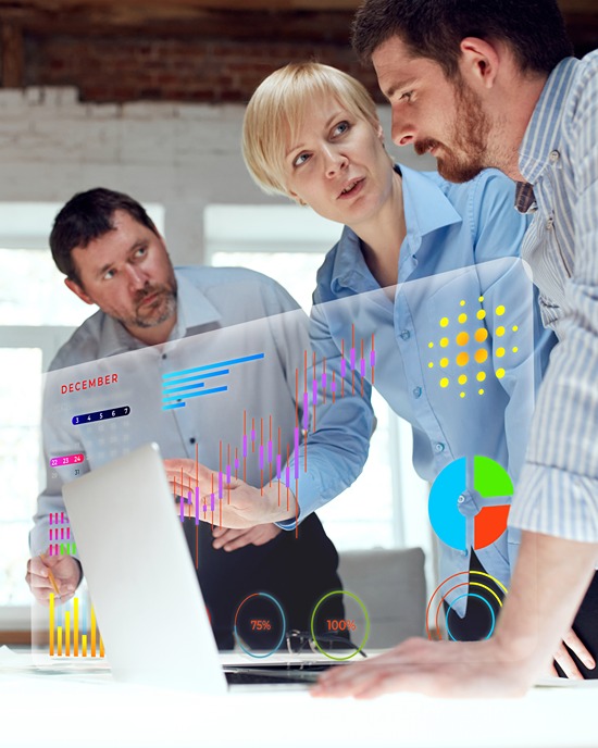 Conceptual collage. Digital calendar, colorful pie chart and trading data panels displayed above laptop during strategy discussion. Concept of digital economy