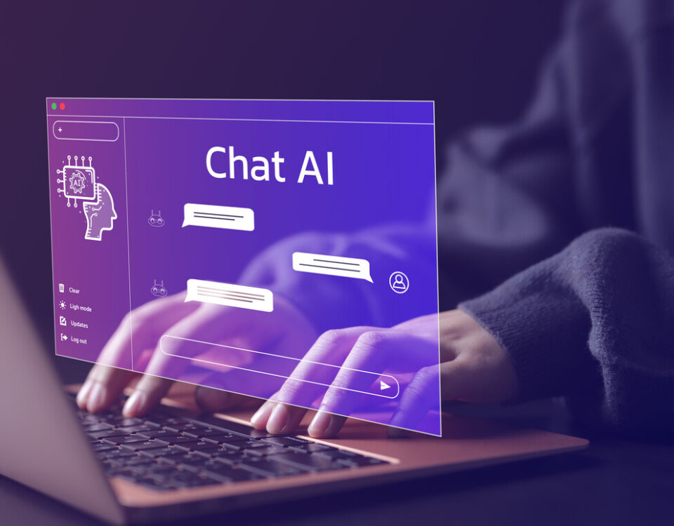 person typing on keyboard with a digital overlay saying chat ai